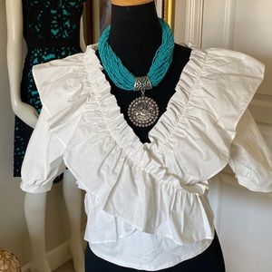 White ruffles top a pretty top for your jeans 💐